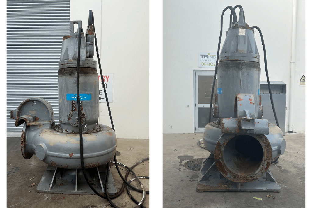 Disassembled Flygt wastewater pump at TRS workshop during overhaul process